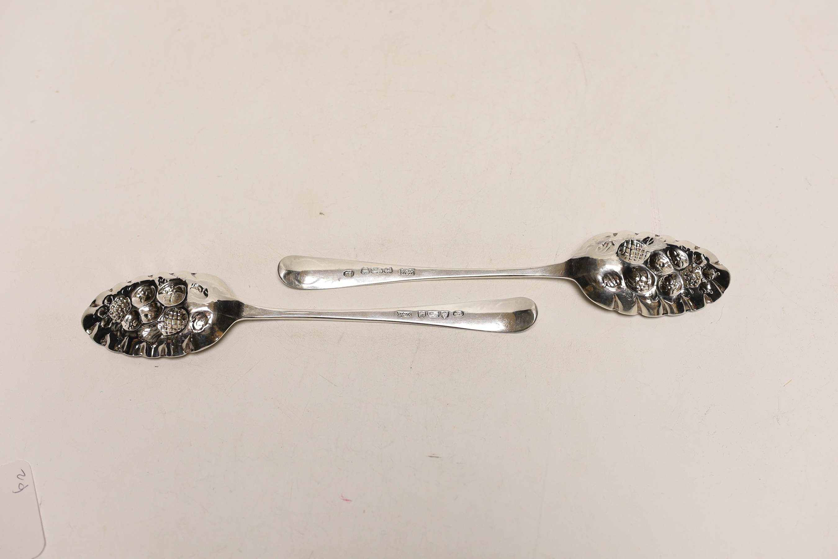 A pair of George III silver Old English pattern 'berry' spoons by Hester Bateman, London, 1784, 21.7cm, 3.6oz.